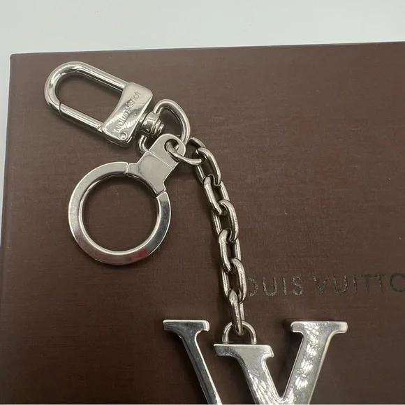 Authentic Louis Vuitton key charm ❤️silver